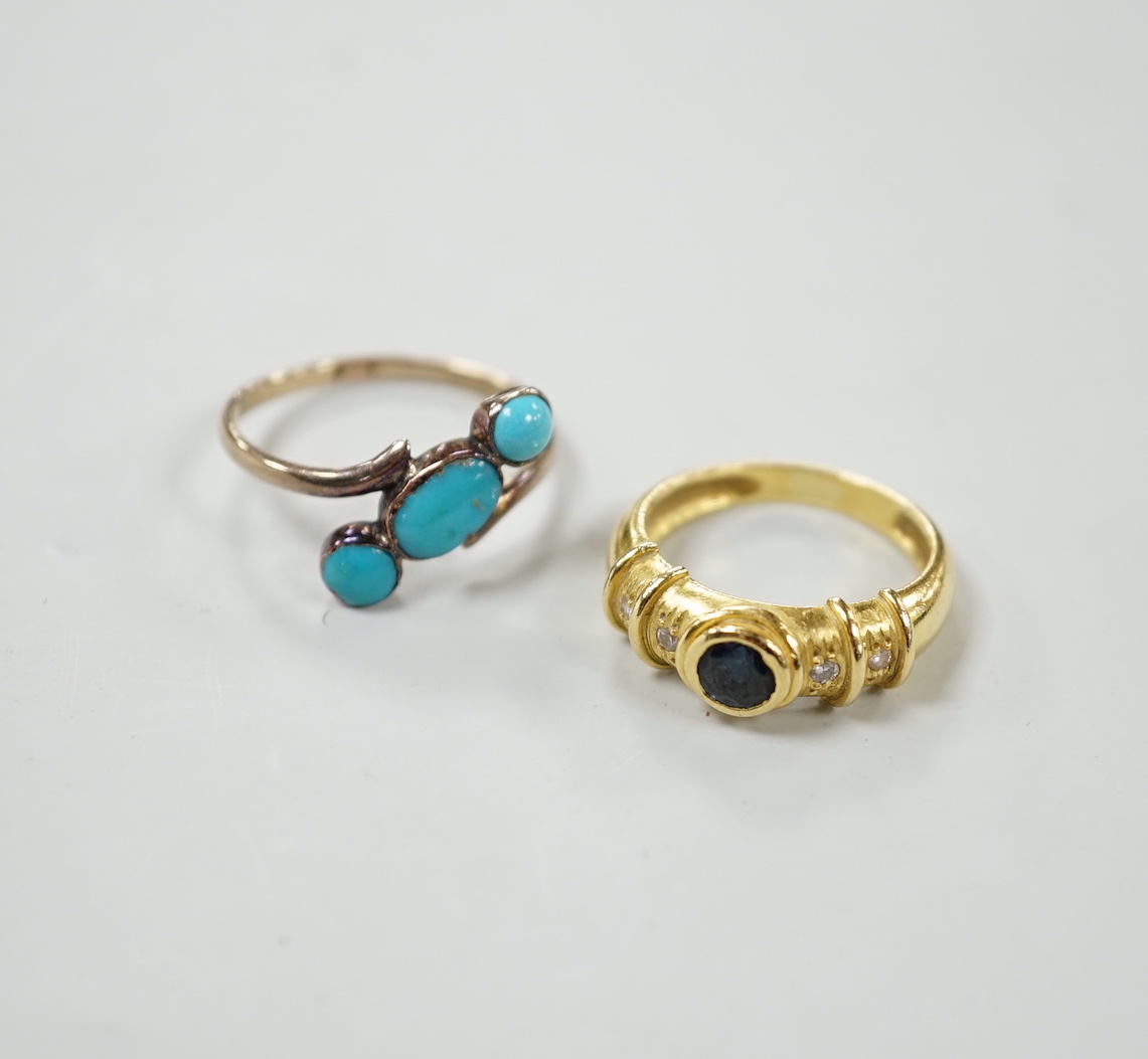 A yellow metal, single stone sapphire and four stone diamond chip set ring, size K and a yellow metal and three stone turquoise set crossover ring.